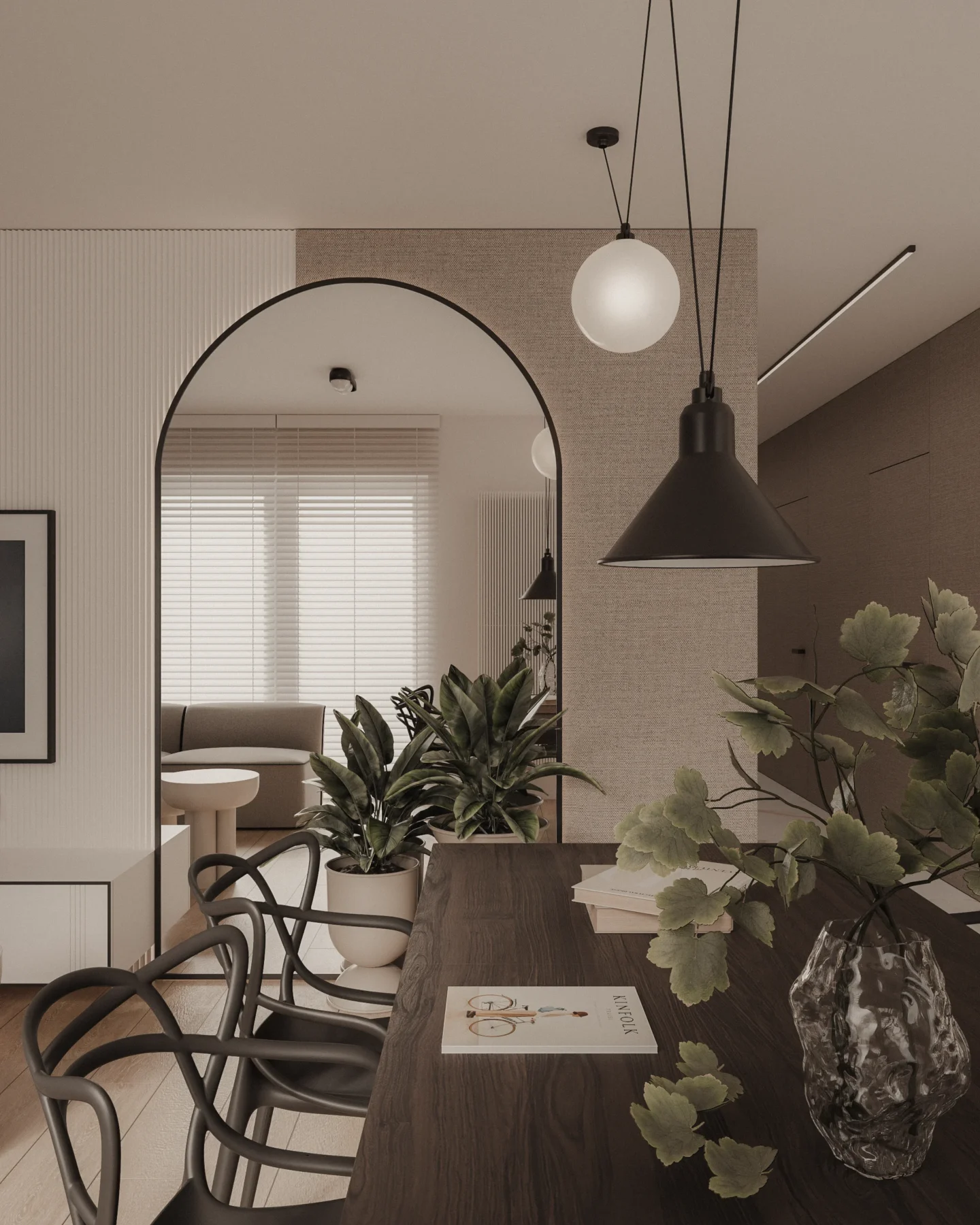 Projekt jadalni w stylu slow living z drewnianym stołem, nowoczesnym oświetleniem, dużym lustrem oraz widokiem na salon utrzymany w naturalnej kolorystyce.